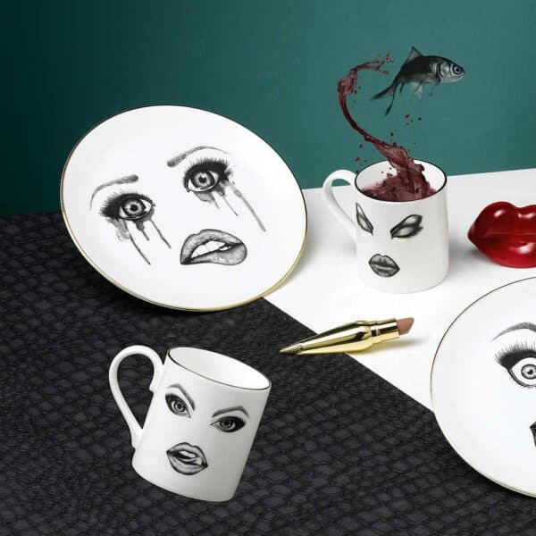 Tableware set with emotional faces made up between shock, passion, sadness and anger