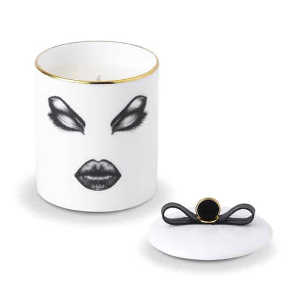 White porcelain candle with bow-tie cover depicting the face of a prima donna in felt.