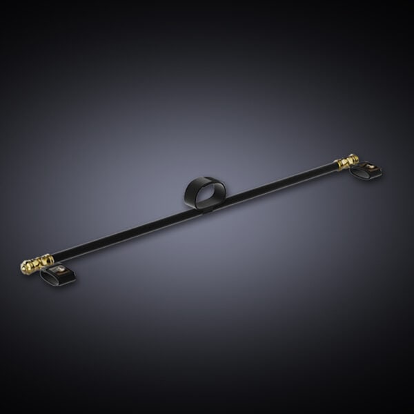 Black background photograph showing a black spreader bar with a collar in the middle and two gold ends with hand ties.
