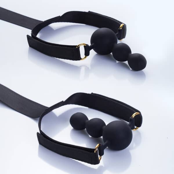 Bondage-Set mit Handhalteband Fußhalteband und Details zu den drei Zubehörteilen Silikonknebel