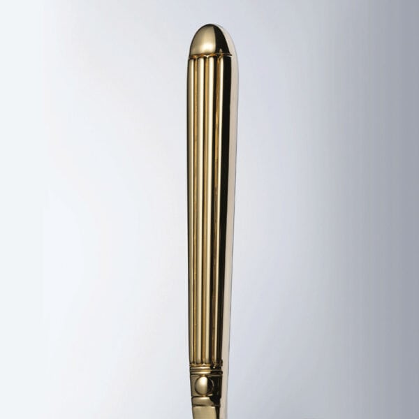 Image on white background showing the handle of a golden sensitivity wheel.