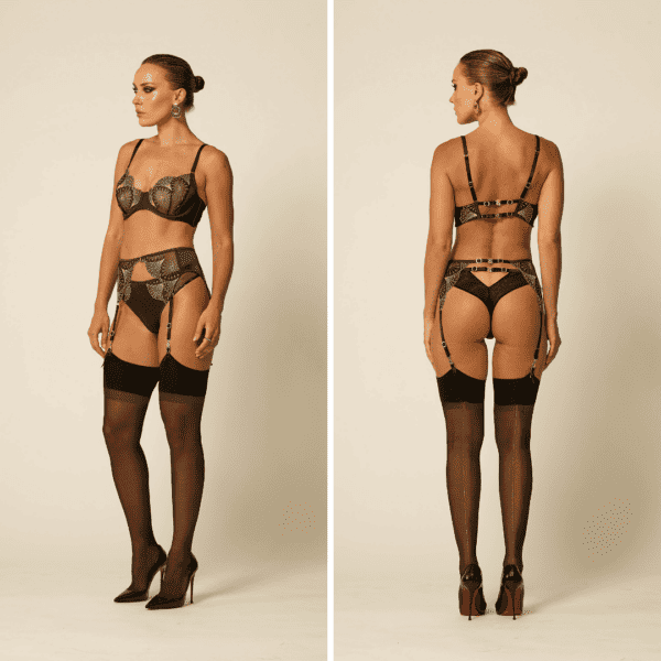Woman standing front and back wearing Vixen & Fox Monarchy bra and Monarchy garter belts, matched with black stockings and pumps. Peacock-inspired collection.