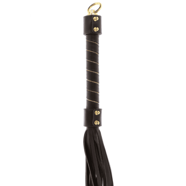 Brown leather whip with gold detailing.