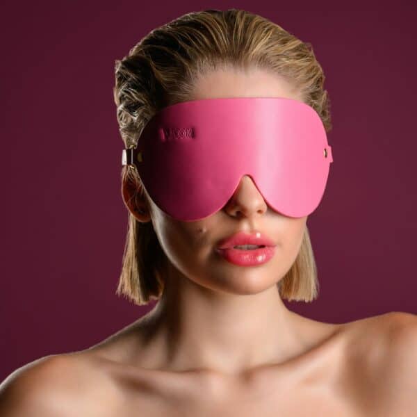 Woman wearing Brigade Mondaine's BDSM Girly mask.