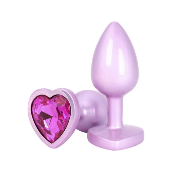 Plug anal Time to Shine en aluminium mauve avec pierre violette scintillante en forme de cœur, design élégant et confortable.