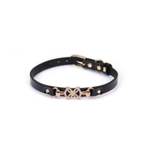 Adjustable Choker in shiny black imitation leather Central bow in gold-plated metal Decorative rhinestones