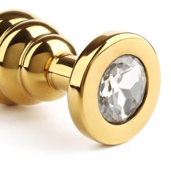 Plug Anal spiral-shaped stainless steel Gold base set with a Diamond Strass jewel