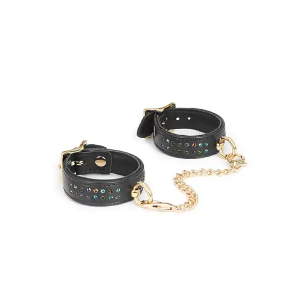 Esposas de piel de vaca auténtica con discretos cristales multicolores, anillos en O y cadena de metal dorado