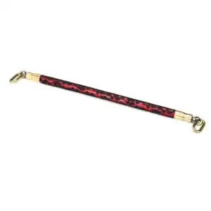 50 cm spacer bar in red imitation leather covered with black lace with gold metal details and fasteners