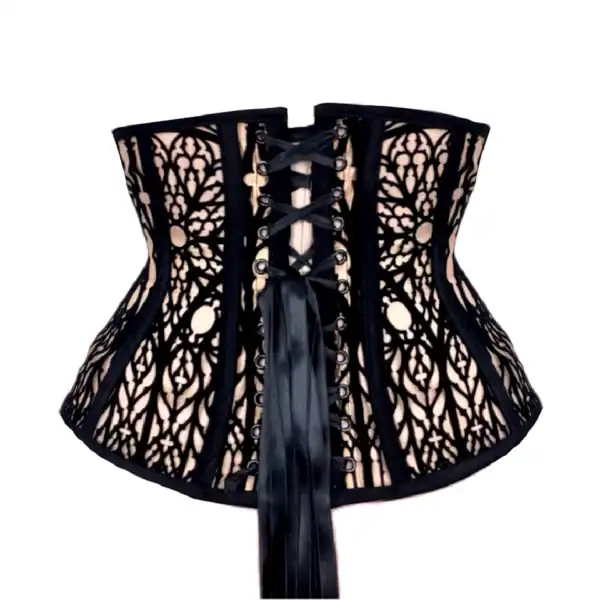 Corset underbust gothique en tulle nude orné de velours noir, avec baleines acier et doublure en velours. Inspiré des formes gothiques. Silhouette structurée et confort assurés.