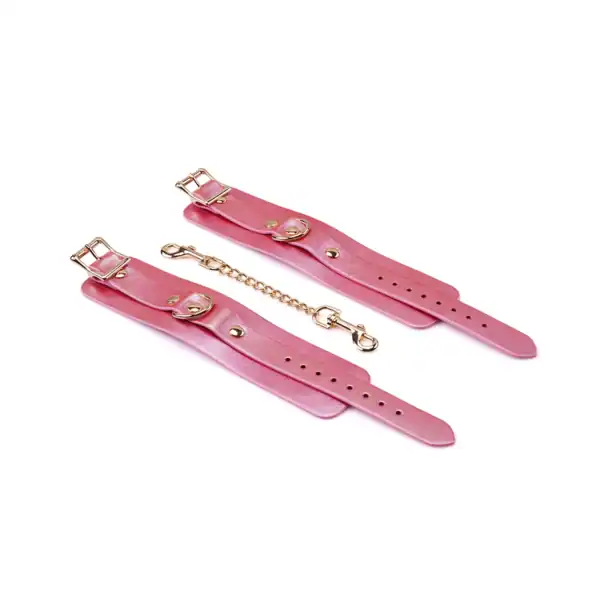 Menottes de poignet en cuir rose irisé avec boucles dorées et chaîne amovible Lustre Rosa