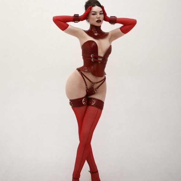 Daelos corset, Astrea thong, Magnus thigh restraints and handcuffs in full-grain red leather with metallic finish, RE:STRICT handmade bondage creations.